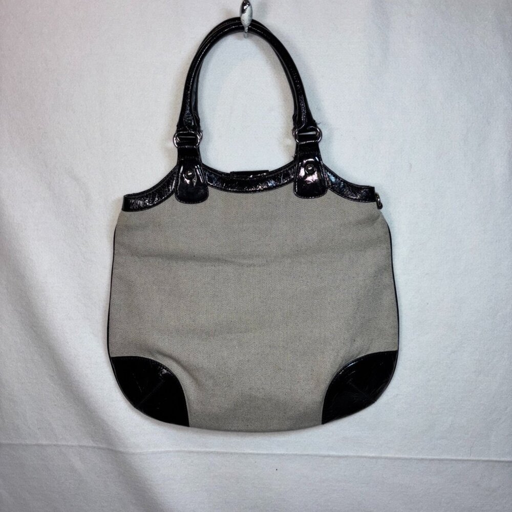 Ann Taylor Loft Black and Beige shoulder tote with silver clasp